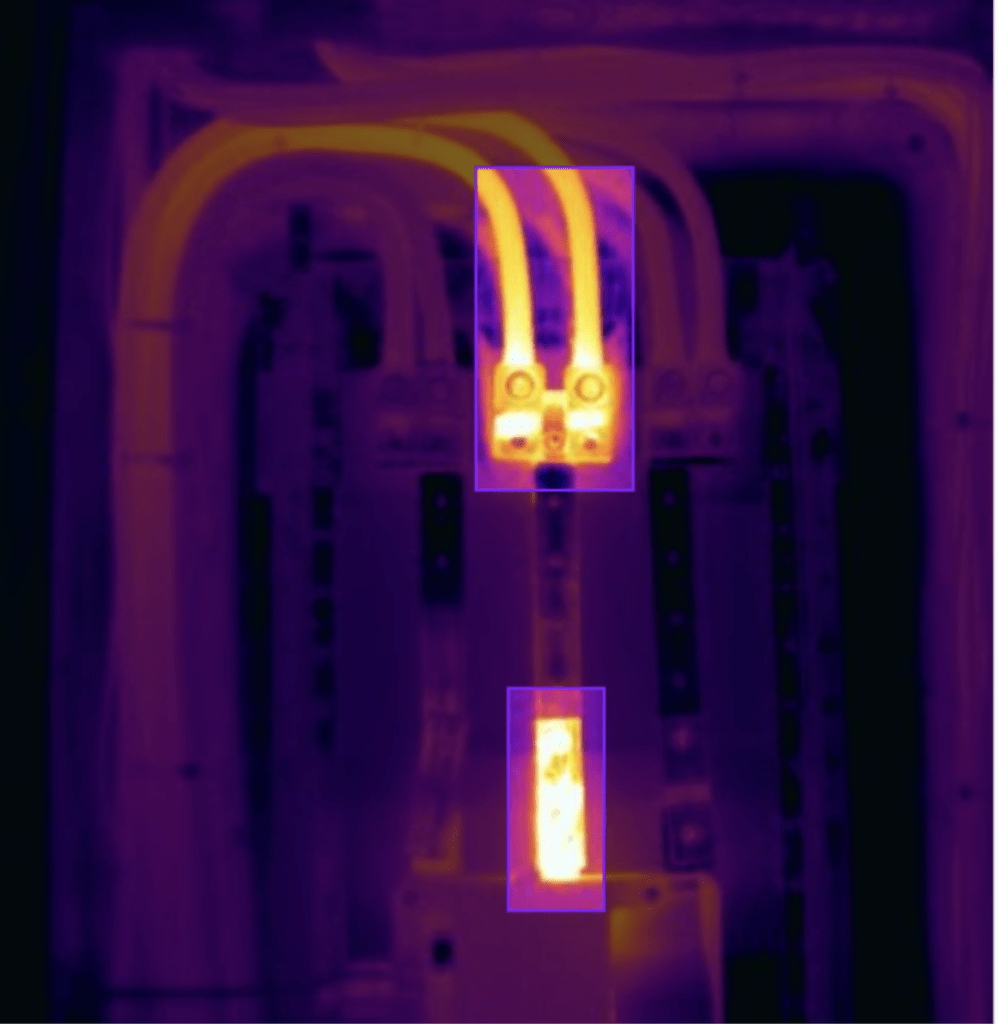 Thermal image of electrical panel with hot spots