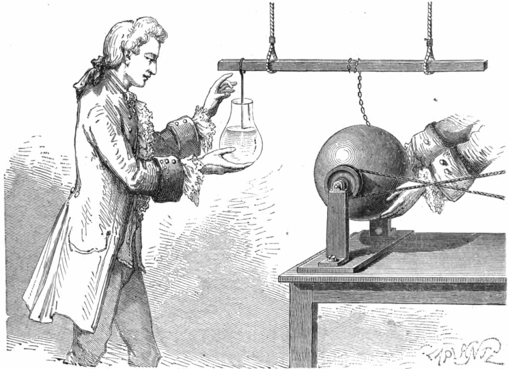 Scientist demonstrating electrostatic device experiment.
